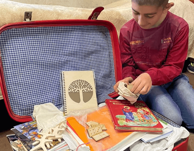 Child with school supplies
